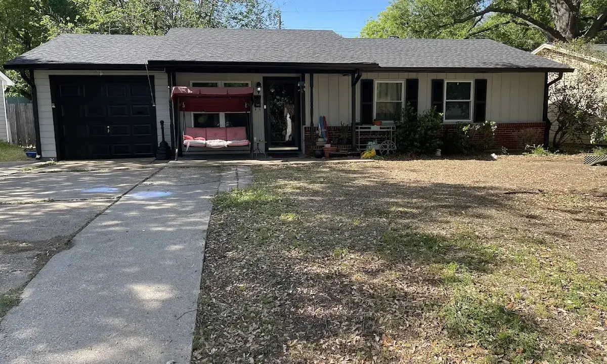 Asphalt Shingle Roof Repair crew at work on a residential roof in Lake Dallas